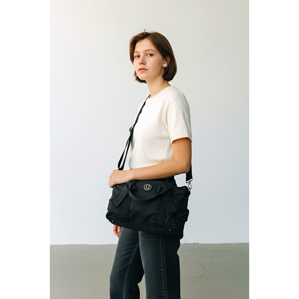 Lululemon Black Nylon Duffel Gym Travel Bag Shoulder Strap Logo Tote Bow